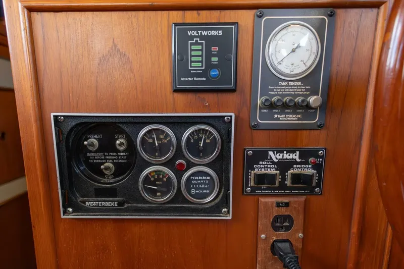 Moonshadow Yacht Photos Pics Control panel of a 1985 Grand Banks 42 Classic yacht with gauges and switches.