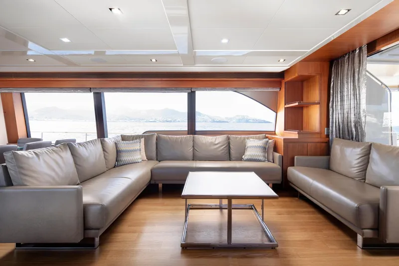  Yacht Photos Pics Luxurious interior of 2014 Custom Line Navetta 26 Crescendo yacht with modern seating and ocean view.