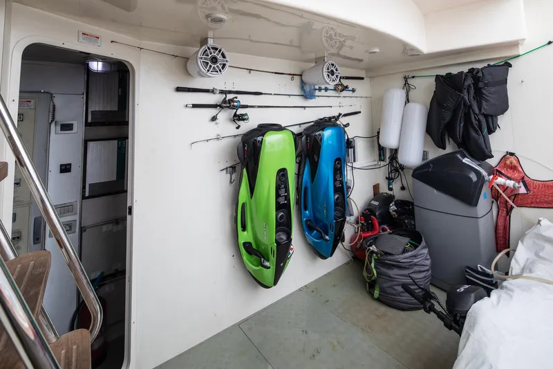  Yacht Photos Pics Storage area on 2014 Custom Line Navetta 26 Crescendo yacht with water sports equipment.