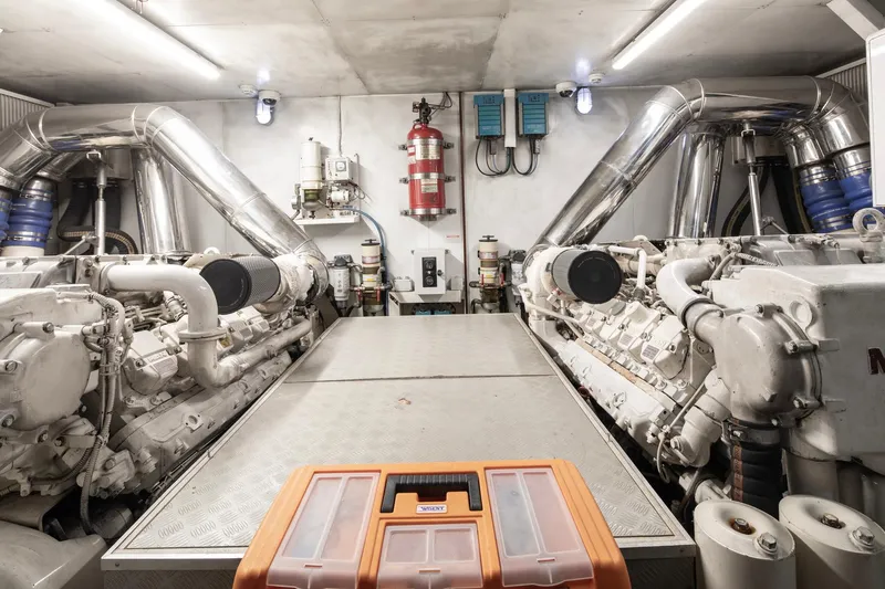  Yacht Photos Pics Engine room of 2014 Custom Line Navetta 26 Crescendo yacht, featuring dual engines and safety equipment.