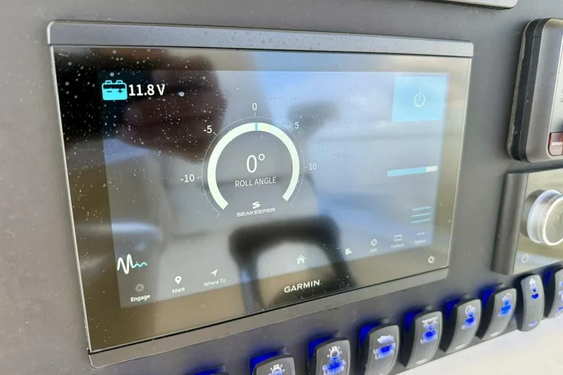 2006 Regulator 29fs Yacht Photos Pics Garmin display on 2006 Regulator 29 Forward Seating showing roll angle and voltage.