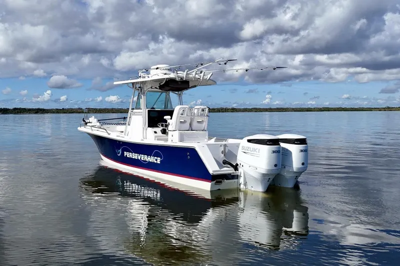 2006 Regulator 29fs Yacht Photos Pics 2006 Regulator 29 Forward Seating boat with twin Suzuki engines on calm water.