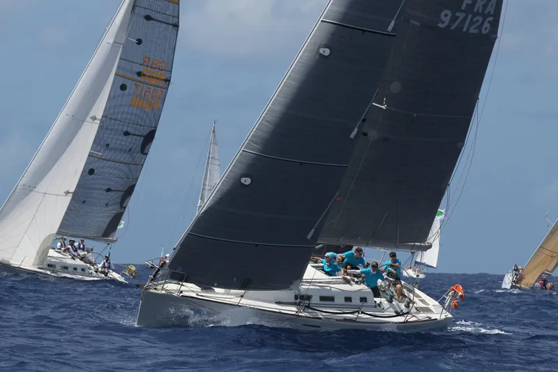  Yacht Photos Pics Sailboats racing on the ocean, featuring a 2004 Beneteau First 40.7.