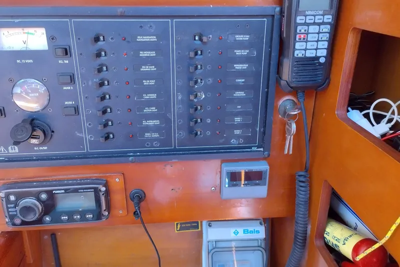  Yacht Photos Pics Control panel of a 2004 Beneteau First 40.7 sailboat with navigation equipment.