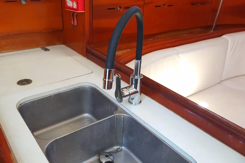  Yacht Photos Pics Galley sink and faucet in 2004 Beneteau First 40.7 yacht interior.