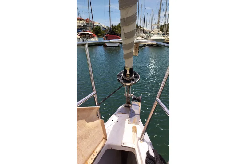  Yacht Photos Pics Bow view of 2004 Beneteau First 40.7 sailboat docked in marina.