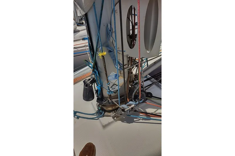  Yacht Photos Pics Close-up of Beneteau First 40.7 sailboat rigging, showcasing ropes and pulleys, 2004 model.