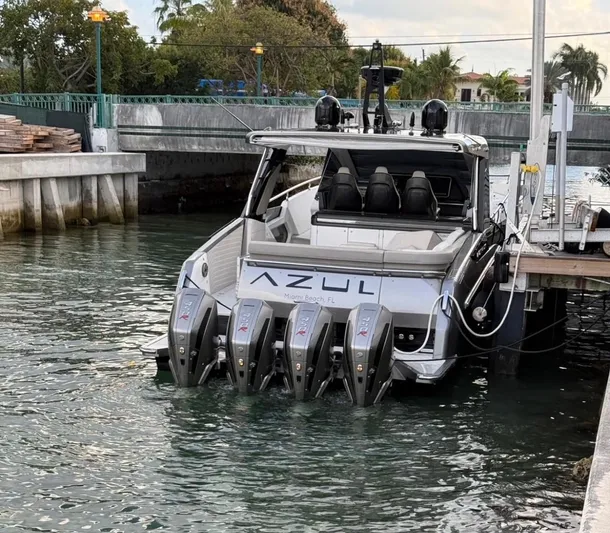  Yacht Photos Pics Azimut Verve 47 yacht docked, rear view with multiple engines, 2021 model.