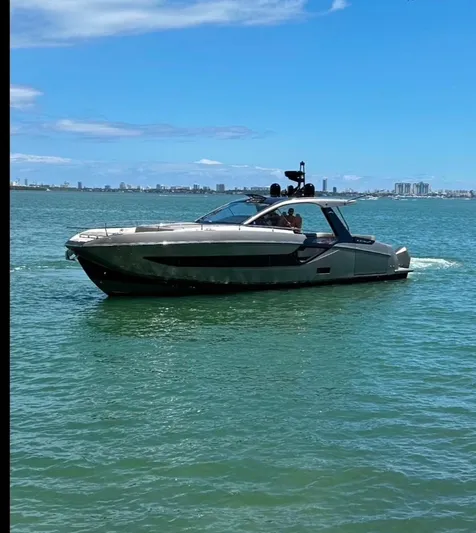  Yacht Photos Pics 2021 Azimut Verve 47 yacht cruising on a sunny day in calm waters.