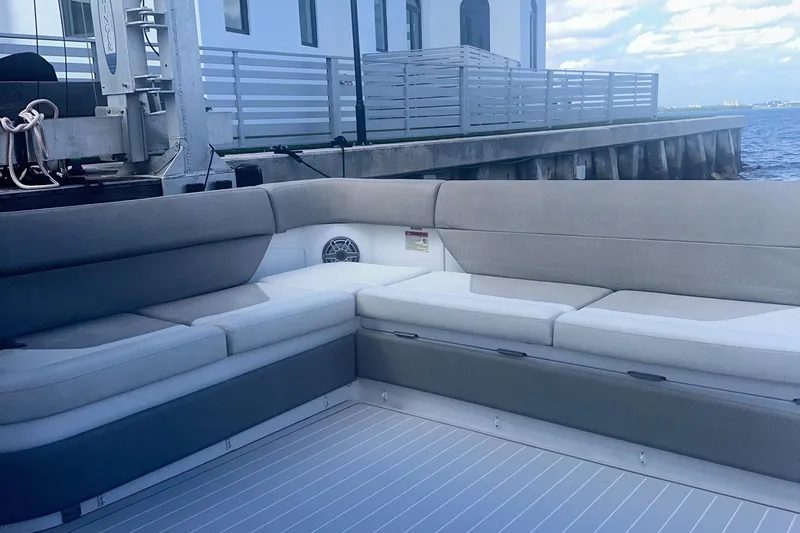  Yacht Photos Pics 2021 Azimut Verve 47 yacht interior with elegant seating by the dock.