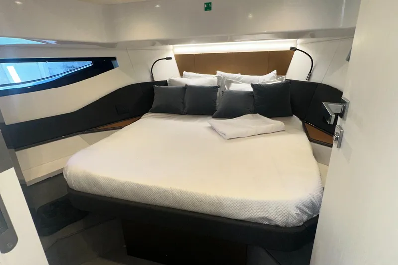  Yacht Photos Pics Luxurious bedroom interior of 2021 Azimut Verve 47 yacht with modern design.