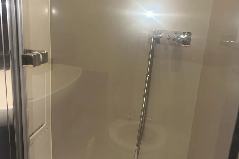  Yacht Photos Pics 2021 Azimut Verve 47 yacht bathroom with modern shower design.