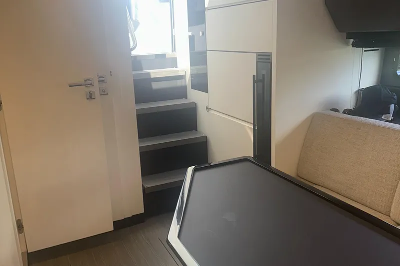  Yacht Photos Pics Interior of 2021 Azimut Verve 47 yacht, featuring modern design and staircase.
