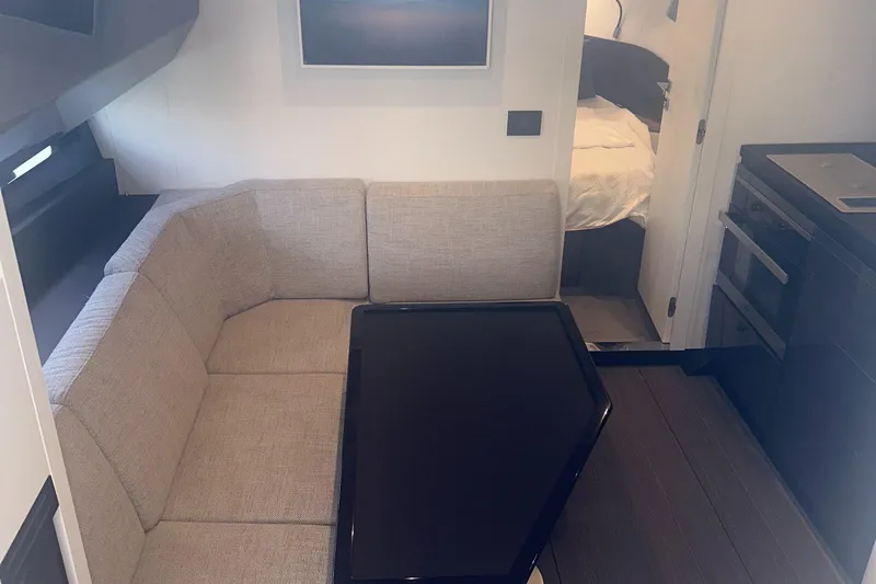  Yacht Photos Pics Interior of 2021 Azimut Verve 47 yacht with cozy seating and modern design.