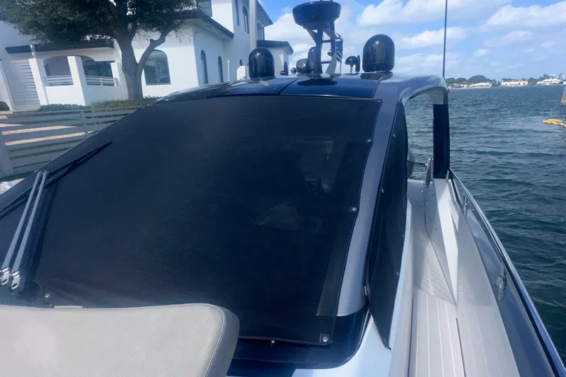  Yacht Photos Pics 2021 Azimut Verve 47 yacht docked by waterfront, showcasing sleek design and modern features.