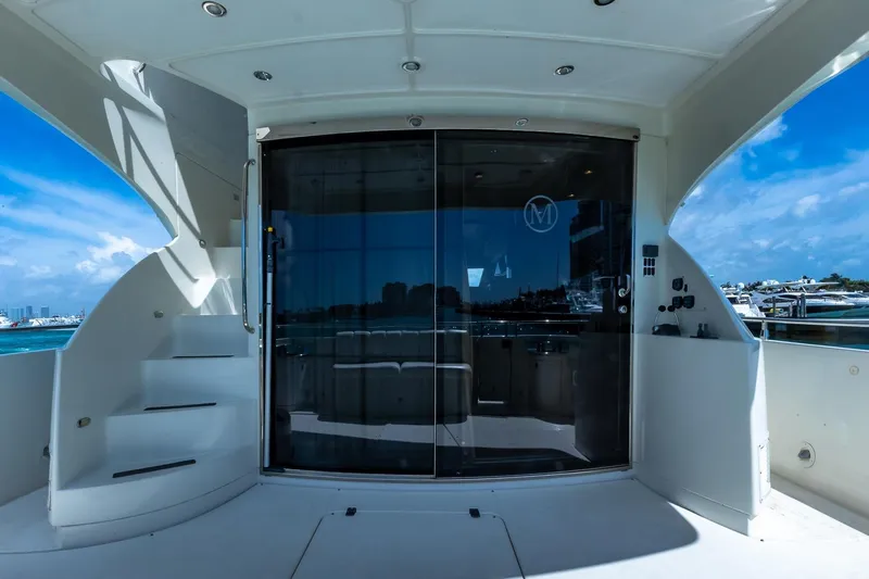  Yacht Photos Pics Luxurious 2005 Marquis 59 yacht interior with sleek design and ocean view.