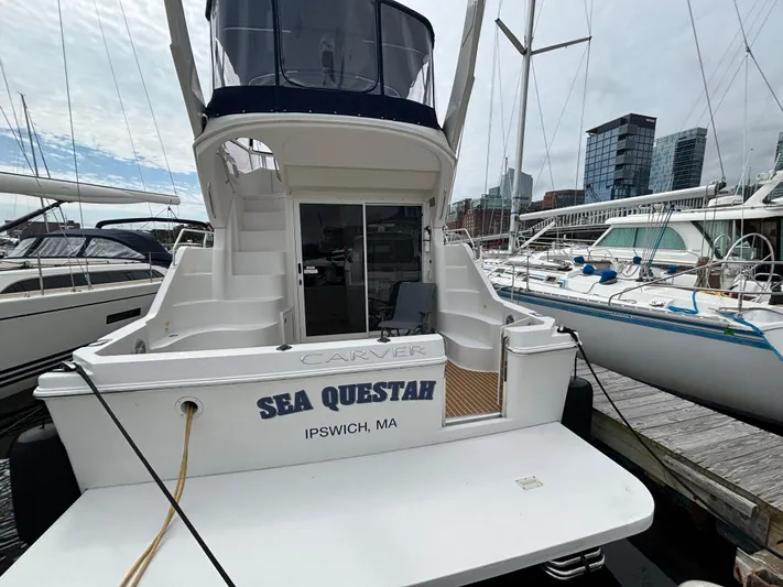 Sea Questah Yacht Photos Pics 2007 Carver 35 Super Sport yacht docked, named "Sea Questah," in Ipswich, MA marina.