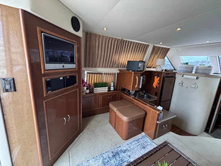 Sea Questah Yacht Photos Pics Interior of 2007 Carver 35 Super Sport yacht with modern amenities and wood finishes.