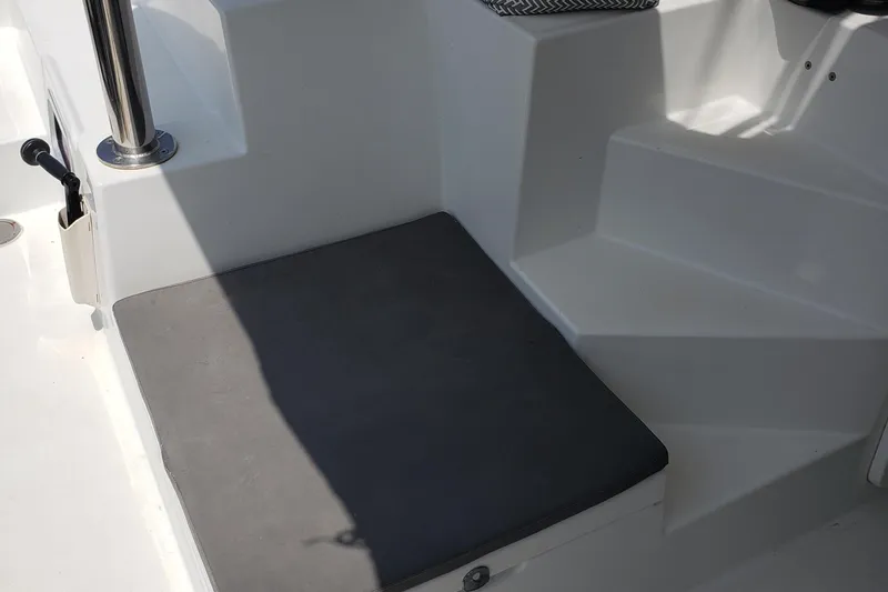 The Next Thing Yacht Photos Pics Cushioned seating area on 2010 Lagoon 400 owner's version catamaran deck.