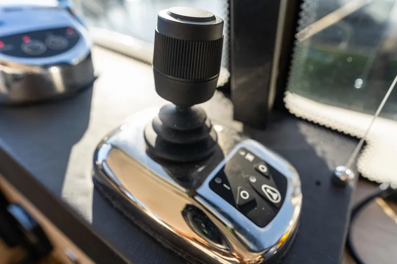 Living Out Loud Yacht Photos Pics Joystick control on 2020 Prestige 420 yacht dashboard.