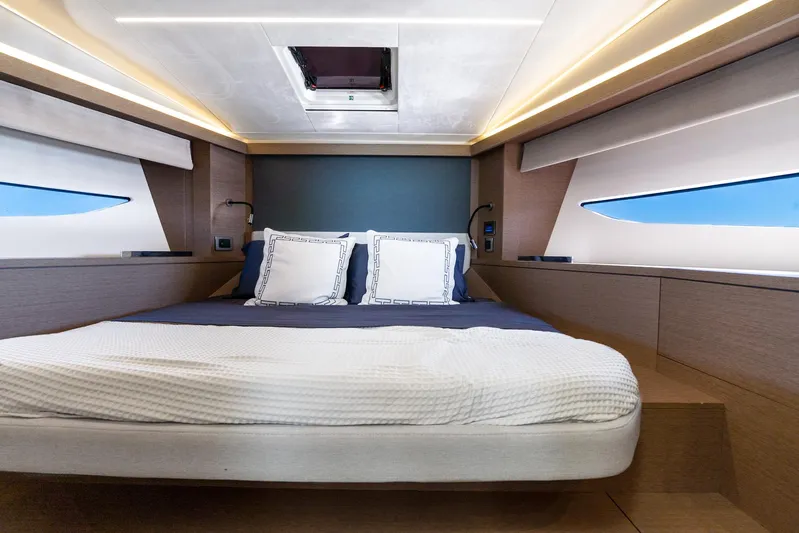 Living Out Loud Yacht Photos Pics Luxurious cabin interior of 2020 Prestige 420 yacht with modern design and comfortable bedding.