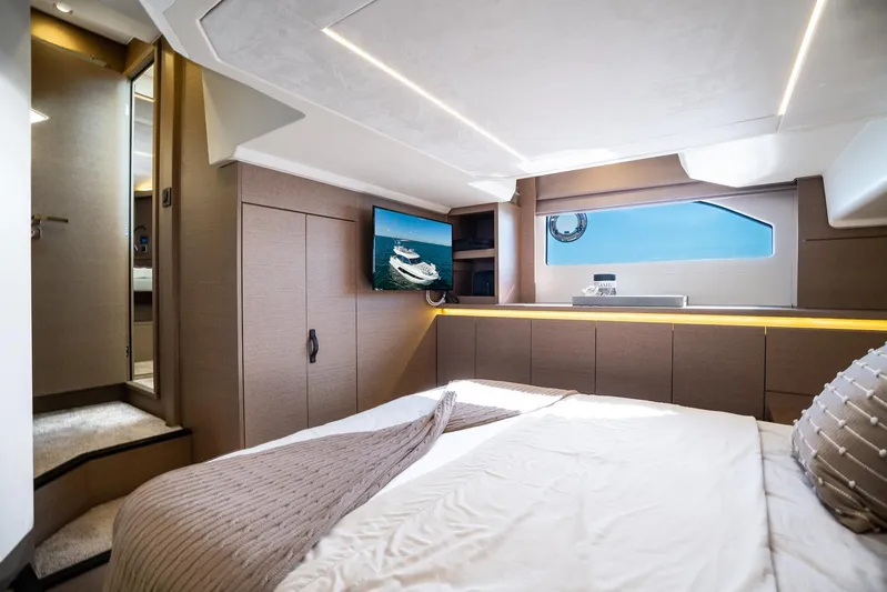 Living Out Loud Yacht Photos Pics Luxurious interior of 2020 Prestige 420 yacht bedroom with modern design and ocean view.