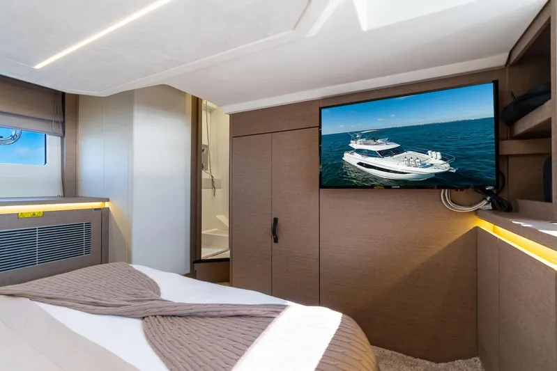 Living Out Loud Yacht Photos Pics Luxurious interior of 2020 Prestige 420 yacht with modern amenities and elegant design.