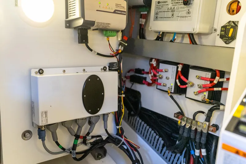 Living Out Loud Yacht Photos Pics Electrical panel inside a 2020 Prestige 420 yacht, showcasing wiring and components.