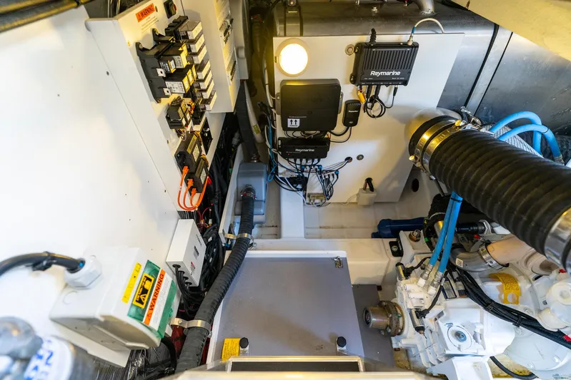 Living Out Loud Yacht Photos Pics Engine room of 2020 Prestige 420 yacht with electrical panels and equipment.