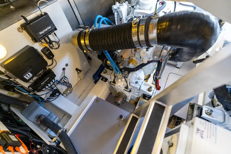 Living Out Loud Yacht Photos Pics Engine room of 2020 Prestige 420 yacht with visible components and wiring.