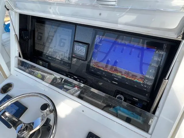  Yacht Photos Pics Control panel of 2020 SeaHunter 39 Tournament boat with advanced navigation displays.