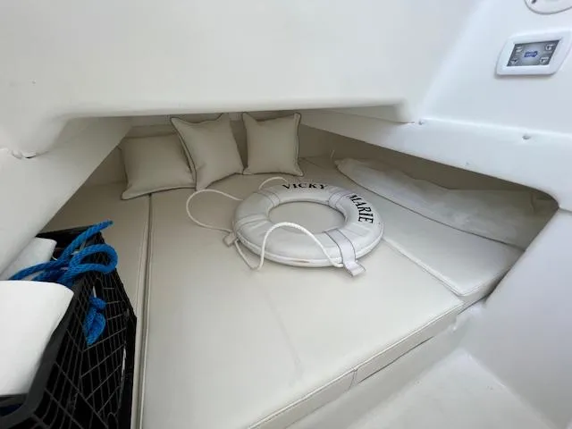  Yacht Photos Pics 2020 SeaHunter 39 Tournament cabin interior with cushions and life preserver.