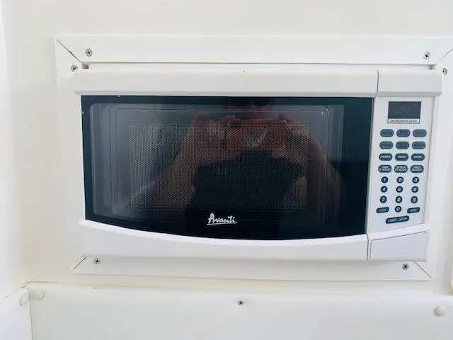  Yacht Photos Pics Built-in Avanti microwave in 2020 SeaHunter 39 Tournament boat kitchen.