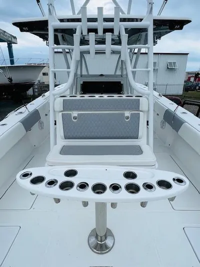  Yacht Photos Pics 2020 SeaHunter 39 Tournament boat interior with rod holders and seating.