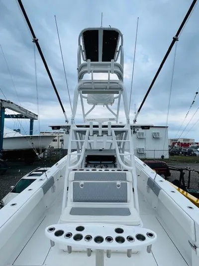  Yacht Photos Pics 2020 SeaHunter 39 Tournament boat with tower and rod holders, docked under cloudy skies.