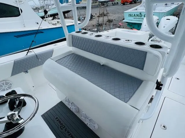  Yacht Photos Pics SeaHunter 39 Tournament 2020 boat interior with cushioned seating and rod holders.