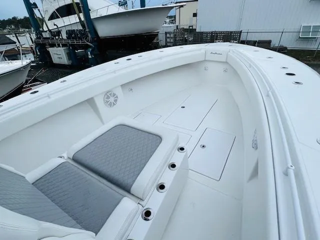  Yacht Photos Pics 2020 SeaHunter 39 Tournament boat interior with cushioned seating and storage compartments.