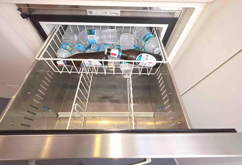  Yacht Photos Pics Open fridge drawer with water bottles and beer on Intrepid 430 Sport Yacht, 2008.