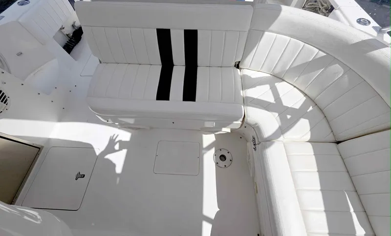  Yacht Photos Pics 2008 Intrepid 430 Sport Yacht interior with white seating and black accents.