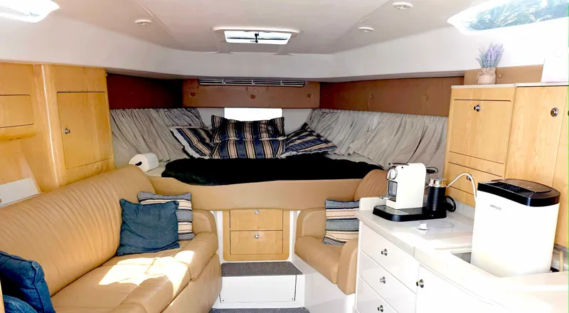  Yacht Photos Pics Luxurious interior of a 2008 Intrepid 430 Sport Yacht with cozy seating and modern amenities.