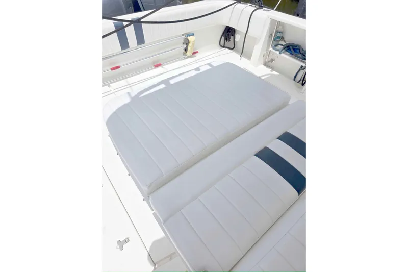  Yacht Photos Pics 2008 Intrepid 430 Sport Yacht interior with white cushioned seating.