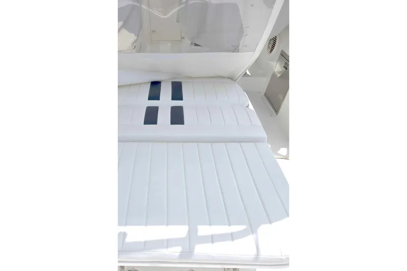  Yacht Photos Pics White cushioned seating on a 2008 Intrepid 430 Sport Yacht, showcasing sleek design.