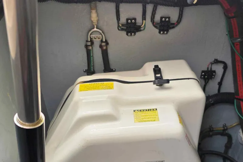  Yacht Photos Pics Engine compartment of a 2008 Intrepid 430 Sport Yacht, showing wiring and components.