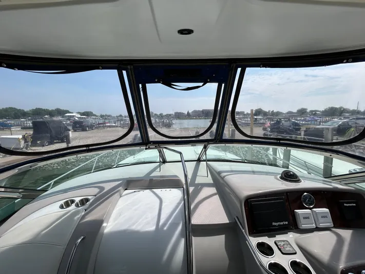  Yacht Photos Pics Interior view of a 2005 Formula 37 PC yacht cockpit with marina in background.