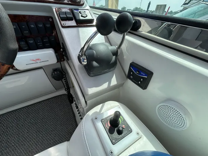  Yacht Photos Pics Control panel of a 2005 Formula 37 PC boat with throttle and joystick.