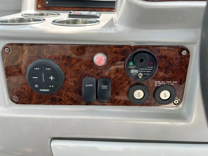  Yacht Photos Pics Control panel of a 2005 Formula 37 PC boat with various switches and dials.