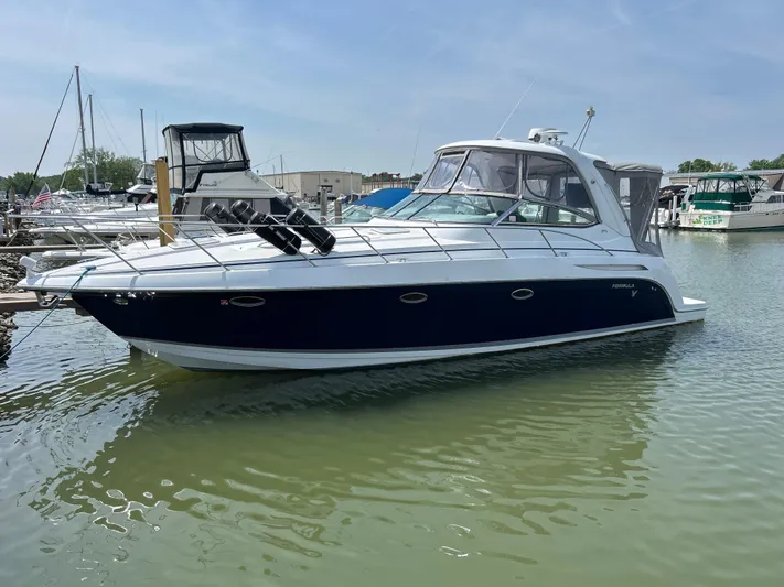  Yacht Photos Pics 2005 Formula 37 PC yacht docked in a marina, featuring sleek design and modern amenities.