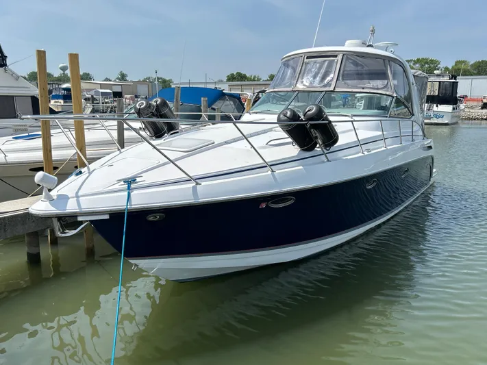  Yacht Photos Pics 2005 Formula 37 PC yacht docked in a marina under clear skies.