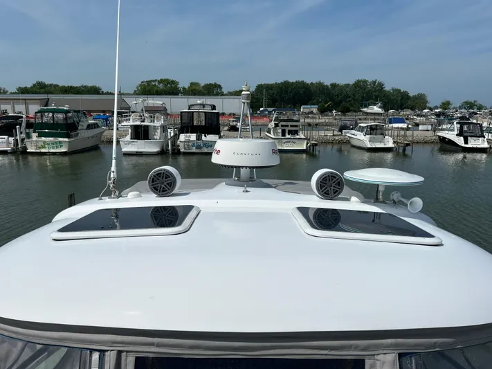  Yacht Photos Pics 2005 Formula 37 PC yacht docked at marina with other boats in background.