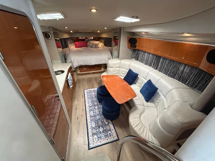  Yacht Photos Pics Luxurious interior of a 2005 Formula 37 PC yacht with cozy seating and elegant decor.